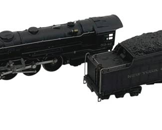 911 - Lionel #5342 Locomotive w/ Coal Car HO Scale (Description): Lionel #5342 locomotive with New York Central coal car in HO scale. The black steam locomotive features detailed running gear and cab. The matching tender is loaded with simulated coal. Measures 2.5" x 9" x 1.5".