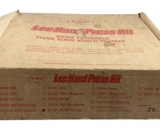 473 - Lee Hand Press Kit (Description): Lee Hand Press Kit. This reloading kit is designed for portable ammunition reloading and is advertised as more powerful than some bench presses. The kit contains essential components for hand reloading operations.