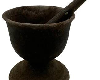 1019 - Cast Iron Mortar & Pestle 8"x5.5" (Description): Cast iron mortar and pestle set. The mortar features a footed base design. Measures 8 inches by 5.5 inches.