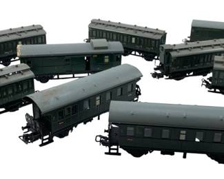 273 - Group Lot of 9 Marklin Train Cars 2"x2"x6" (Description): Group lot of 9 Marklin train cars. Each car measures approximately 2 inches by 2 inches by 6 inches.