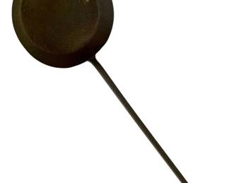 51 - Hand Forged Wrought Iron Long Handle Fry Pan (Description): Hand forged long handle frying pan with a round bowl and elongated handle featuring a hanging loop at the end. This utilitarian piece showcases traditional blacksmithing techniques with its dark patinated finish. Measures 41 inches in total length by 12 inches in diameter.