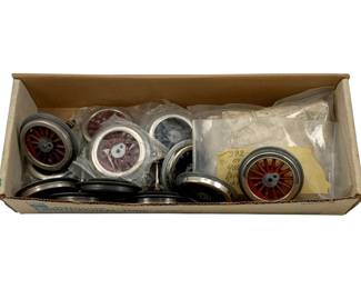 955 - Box Lot Train Parts (Description): A box lot of assorted train parts. The collection includes various wheels and components suitable for model train restoration or hobbyist projects.