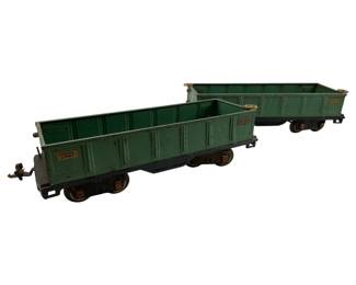 745 - Group of 2 Lionel Lines No 512 Gondola Cars (Description): Group of two Lionel Lines No. 512 Gondola Cars. These vintage train cars feature the classic open-top gondola design. Each car measures 3.25 inches high by 12 inches long by 4 inches wide.