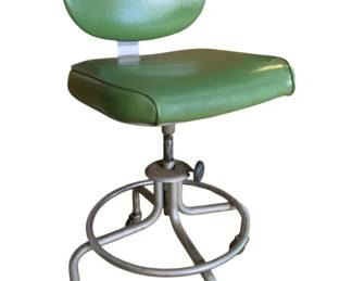 816 - Vtg Green Vinyl Rolling Office Chair (Description): Vintage rolling office chair featuring green vinyl upholstery on both the seat and oval backrest. The chair is mounted on a chrome metal base with a circular footrest ring and rolls on casters. Features an adjustable height mechanism. Measures 36" x17" x 18" with a 25" seat height.