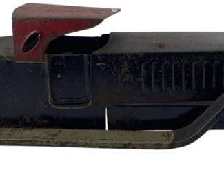 287 - Vintage Schieble Toy & Novelty Co Roadster (Description): Antique toy metal car in pressed steel construction. This early automotive-style roadster features a dark blue body with a red windshield frame, yellow-colored disc wheels, and a rounded hood with vertical grille detail. The car shows age-appropriate wear and patina consistent with its vintage. Measures 6"x6"x18".