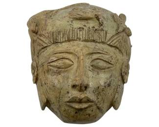 946 - Alabaster Mask Wall Art 3.5"x10.5"x8" (Description): Alabaster mask wall art featuring carved facial features and decorative detailing. Measures 3.5 inches by 10.5 inches by 8 inches.