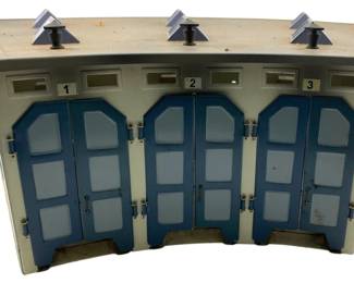 209 - Marklin HO Gauge 3 Stall Roundhouse Engine (Description): Marklin HO Gauge 3 Stall Roundhouse Engine House. This model train accessory features three numbered stalls with double doors. Measures 5"x18"x14".