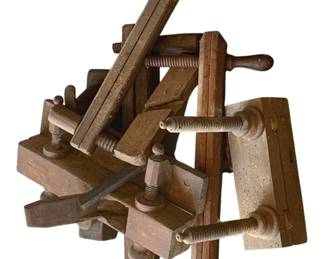 519 - Lot Antique Tools (Description): These appear to be wooden components with threaded mechanisms, likely from vintage woodworking tools or clamps.