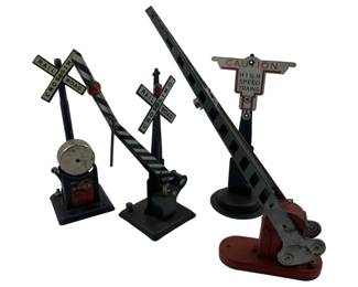 233 - Group Lot of 4 Railroad Signs 8" (Description): Group lot of four railroad signs. The collection includes various railroad crossing signs and signal accessories. Measures 8 inches.