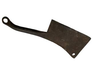 59 - 19th C. Hand Forged Wrought Iron Cleaver (Description): Primitive 19th century hand forged wrought iron food chopper featuring a curved handle with a hanging loop at the end and a rectangular blade with a mounting hole. The piece displays a dark patina consistent with age and use. Measures 18" x 16".