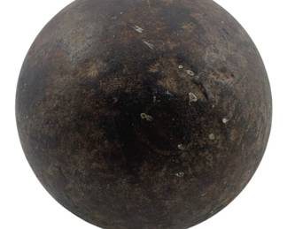 415 - 12 Pound Cannonball 4" (Description): A 12 pound cannonball measuring 4 inches in diameter. The iron sphere exhibits an aged patina consistent with historical artillery ammunition.