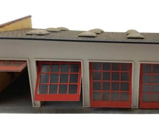 377 - Heljan Car Service Station Model Train (Description): Heljan (232) Car Service Station structure for model train display. This detailed building features service bays and is designed for use with model train layouts. Measures 2" x 6.5" x 4.5".