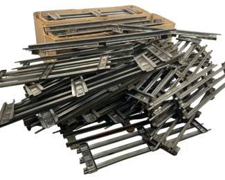 217 - Lot of Train Tracks (Description): A lot of train tracks. This collection includes various metal track sections suitable for model train layouts.