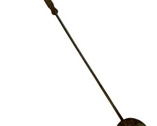 65 - Hand Forged Wrought Iron Primitive Skimmer (Description): Hand forged wrought iron primitive skimmer with signed handle. This hearth cooking utensil features a long slender handle with a ring loop for hanging at the top, leading to a round perforated bowl for skimming liquids. The iron shows a rich aged patina consistent with antique hand-forged pieces. Measures 50 inches by 7 inches.