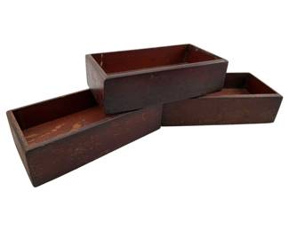 716 - Group of 3 Antique Wood Boxes (Description): Group of three antique wood boxes featuring a dark reddish-brown finish with visible wear consistent with age and use. Boxes measure 2.5 x 6.5 x 4.25 inches.
