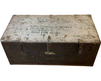 1111 - Vtg Military Style Wood Shipping Crate (Description): Vintage military-style wood shipping crate with olive drab painted body and weathered white-painted lid. Features metal latches on the front and stenciled text on both the lid and front panel, including shipping information referencing Martinsville, VA. The crate shows authentic wear consistent with age and use. Measures 13" x 17" x 30".