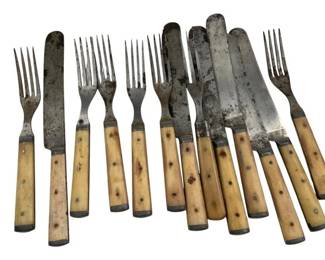 756 - Goodell Company Bone Handle Forks & Cutlery (Description): A collection of thirteen pieces of Goodell Company cutlery featuring bone handles. The set includes forks and knives with steel blades and tines secured to the bone handles with metal bolsters and rivets. Forks measure 7.5 inches in length; knives measure 9 inches in length.