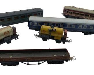 343 - Marklin Passenger Train Cars & Gas Tankers (Description): Group of Marklin passenger train cars and gas tanker cars. The collection includes various passenger coaches and fuel tanker wagons. Measures 9 inches by 2 inches by 1 7/8 inches.