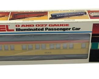 856 - Lionel Illuminated Passenger Car O Gauge Toy (Description): Lionel Special Passenger Car in O Scale, complete with original box. This illuminated passenger car is designed for O and 027 gauge layouts. The car features a cream and yellow color scheme with red accents, numbered 0583, and is housed in its original Lionel packaging showing the illumination feature.