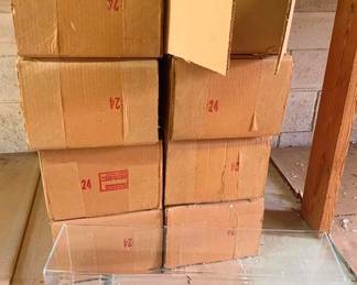 425 - Group Lot of 8 Train Display Cases (Description): Group lot of 8 train display cases. Each case features a clear acrylic cover with a wooden base, suitable for showcasing model trains or similar collectibles. Measurements: 10" x 25" x 7.5".