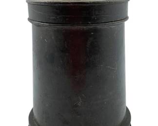 115 - Antique Pewter Mold 6"x4" (Description): Antique pewter mold featuring a cylindrical body with a stepped base and a distinctive domed lid topped with a cluster of rounded ball-shaped forms. The piece displays a dark patina consistent with age and use. Measures 6 inches tall by 4 inches in diameter.