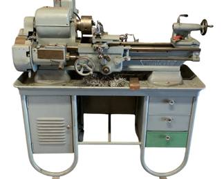 1253 - Sheldon Machine Co. Metal Lathe w/ Stand & (Description): Contents - 53 x 51 x 22 Used as is electric/electronic/mechanical item. No guarantee all components, untested.