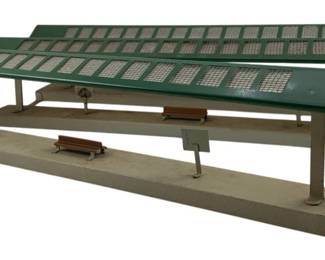 240 - Vintage Kirby Train Terminals 5"x19"x7" (Description): Vintage Kirby train terminals featuring covered platform design with benches. These model train accessories measure 5 inches by 19 inches by 7 inches.