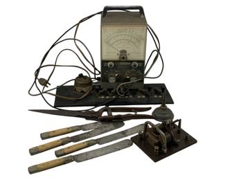 1102 - Lot Vtg Tools & Equipment w/ Voltmeter (Description): A lot of vintage tools and equipment including a Heathkit vacuum tube voltmeter with attached cord, a telegraph key or Morse code sounder on a metal base, a pair of large metal shears or scissors, and three bone-handled knives showing patina consistent with age. The collection represents a variety of antique and vintage functional items. Used as is electric/electronic/mechanical