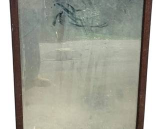 452 - Ant. Wood Framed Mirror 32"x26" (Description): Antique wood framed mirror with a simple, classic frame design. The mirror shows character consistent with its age. Measures 32 inches by 26 inches.