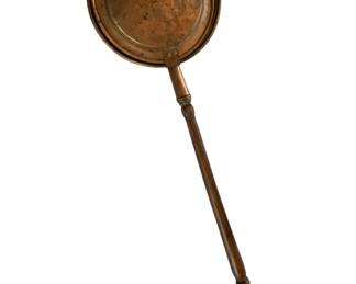 39 - Vtg Copper & Brass Bed Warming Pan (Description): Vintage copper and brass bed warming pan featuring a hammered copper pan with brass rim and a turned wooden handle with decorative finial. The pan has a hinged lid and shows a rich, warm patina consistent with age. Measures 3.5" x 43" x 11.5".