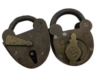 800 - Group of 2 Padlocks Without Keys 1.5"x1.5" (Description): Group of two antique brass and iron padlocks without keys. Both feature heart-shaped bodies with decorative elements and heavy iron shackles. Measurements: 1 1/2" x 1.5".