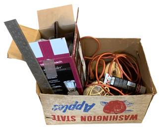 1139 - Box Lot Assorted Household Items (Description): Box lot of assorted household items including orange extension cord, a ruler, work light with cage, and various other miscellaneous items.