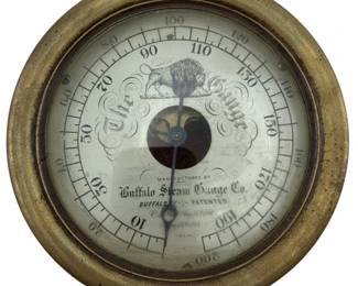 699 - Buffalo Steam Gauge Co Brass Railroad Clock (Description): Brass railroad clock manufactured by Buffalo Steam Gauge Co. of Buffalo, NY. The dial features decorative scrollwork and a buffalo illustration. Measures 3 inches by 7 inches. Used as is electric/electronic/mechanical item. No guarantee all components, untested.