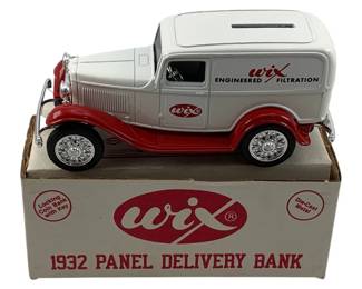 1206 - Wix 1932 Panel Delivery Die-Cast Metal Bank (Description): Wix 1932 Panel Delivery die-cast metal bank truck with original box. This locking coin bank features a key and displays the Wix Engineered Filtration branding. The truck is finished in white and red with chrome-style spoke wheels. Comes with original Wix branded packaging.