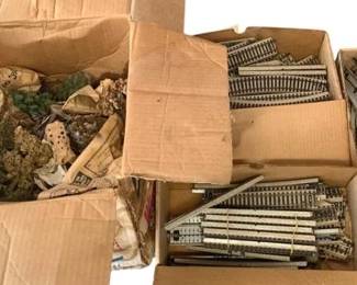 499 - Lot of O Scale Train Tracks (Description): A lot of O scale train tracks. This assortment includes various track pieces suitable for model railroad layouts.