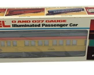 855 - Lionel Special Observation Car O Scale Toy (Description): Lionel Special Observation Car in O Scale, presented in its original box. This illuminated passenger car features a cream and maroon color scheme with the number 9585 displayed on the side. The car is compatible with O and O27 gauge track systems. Comes in the original Lionel packaging showing the illuminated passenger car line.