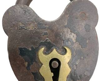 673 - Vintage Padlock w/o Key 4"x3" (Description): Vintage padlock without key. The lock features a heart-shaped body with a brass escutcheon plate around the keyhole. Measures 4 inches by 3 inches.