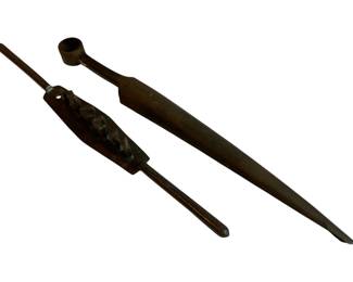 1054 - 2pc Lot Antique Tools 29" (Description): A two-piece lot of antique tools. The lot includes what appears to be a ladle or similar implement with a cup-shaped end and a long handle, along with a second tool with decorative elements. Measures 29 inches.