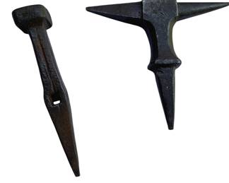 774 - Vintage Hand Forged Iron Tool & Stake 7"x6" (Description): Vintage hand forged iron tool and stake. These blacksmithing implements feature traditional hand-forged construction with a stake anvil and accompanying tool. Measures 7 inches by 6 inches.