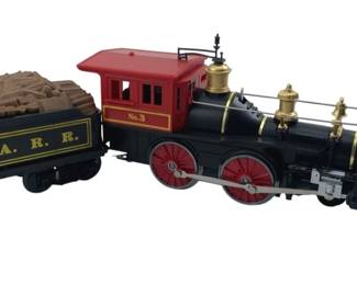 413 - Lionel Locomotive & Coal Train Car (Description): Lionel locomotive and coal train car set. The locomotive measures 4 inches by 10 inches by 2.5 inches, and the coal car measures 3 inches by 4 inches by 2.5 inches.