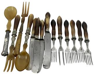 976 - 15pc Antique Utensils/Flatware (Description): A collection of fifteen pieces of antique utensils and flatware. The assortment includes various serving pieces and dining implements featuring decorative handles.