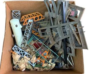 350 - Box Lot of Model Train Display Accessories (Description): Box lot of model train display accessories. This assortment includes various components and parts suitable for creating or enhancing model train layouts and displays.