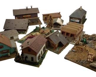 380 - Group Lot Model Train Display Houses (Description): Group lot of model train display houses with horses and fruits scene. This collection features multiple miniature buildings suitable for model train layouts, accompanied by scenic elements including horses and a fruits scene.