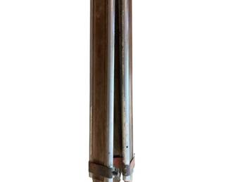 817 - Vtg Metal Tripod w/ Wooden Legs 37" (Description): Vintage metal tripod featuring wooden legs with red-painted feet. The collapsible design includes metal fittings and an orange-red top mounting plate. Shows patina and wear consistent with age and use. Measures 37 inches when folded.