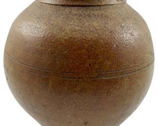 117 - Vintage Ceramic Clay Pot 8"x6.5" (Description): Vintage ceramic clay pot featuring a rounded bulbous body with a rolled rim and tapered base. The vessel displays a warm brown salt-glazed finish with natural variations in tone and texture, along with an incised decorative band around the midsection. Measures 8 inches tall by 6.5 inches in diameter.