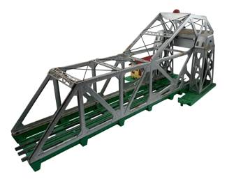 347 - No 313 Lionel Draw Bridge 9"x21"x10.5" (Description): Lionel No 313 Draw Bridge. This model railroad accessory features a detailed truss bridge design with operational draw bridge mechanism. Measures 9 inches by 21 inches by 10.5 inches.