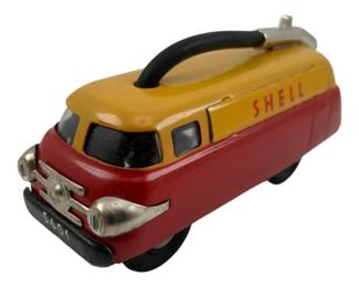 743 - Schuco Radiant Service 5601 Toy Truck (Description): Schuco Radiant Service 5601 toy truck featuring Shell branding. This vintage tin toy showcases classic mid-century styling. Measures 2 inches by 4.5 inches by 1.5 inches.