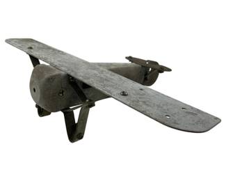 707 - Vintage Metal Model Airplane (Description): Vintage metal model airplane, missing pieces. Measures 3 inches by 12 inches by 7.5 inches.