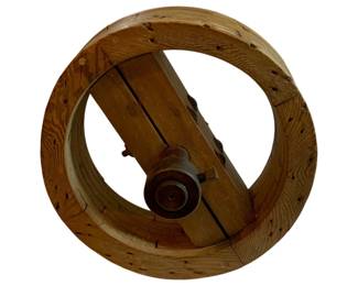 1068 - Antique Wood Wheel 20"x12" (Description): Antique wood wheel featuring a circular rim with central hub and support structure. The wheel displays traditional construction methods with visible wooden joinery. Measures 20 inches by 12 inches.