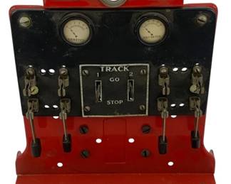 967 - Lionel #440C Panel Board 8.5"x7"x3.5" (Description): Lionel #440C Panel Board. This vintage model train control panel features an ammeter and volt-meter, track controls with Go/Stop switches for two tracks, and multiple lever switches. Made by The Lionel Corporation. Measures 8.5 inches by 7 inches by3.5 inches. Used as is electric/electronic/mechanical item. No guarantee all components, untested.